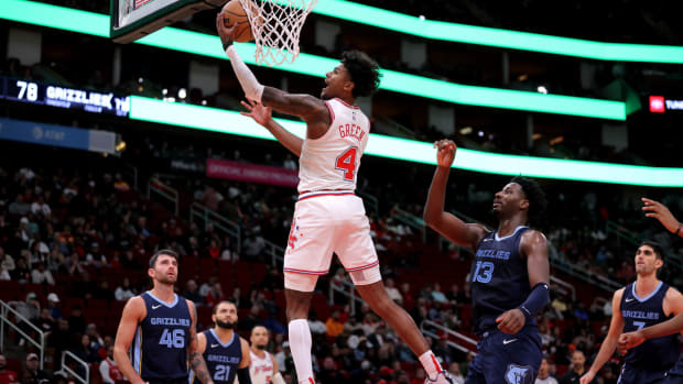 Houston Rockets guard Jalen Green (4) shoots against the Memphis Grizzlies during the fourth quarter at Toyota Center.